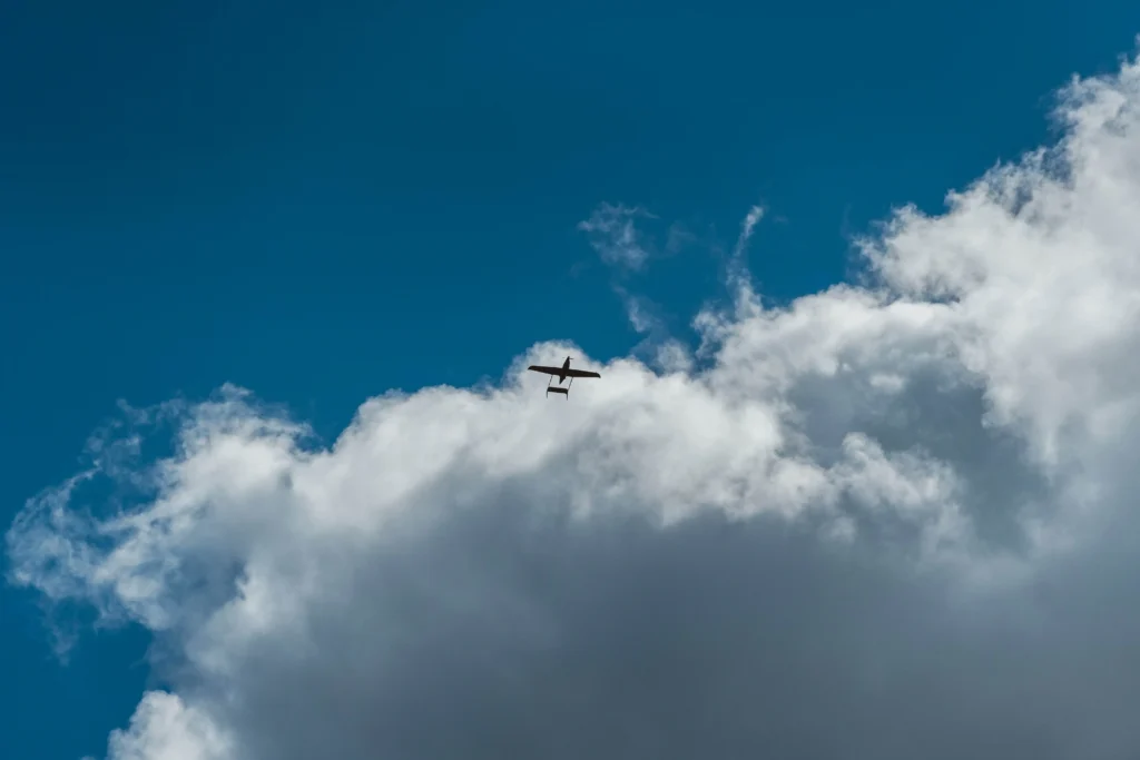 Raybird UAV flying above clouds